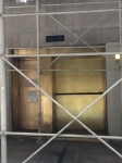 The shiny doors of 101-121 East 49th Street.